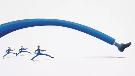 Businessman stretching foot